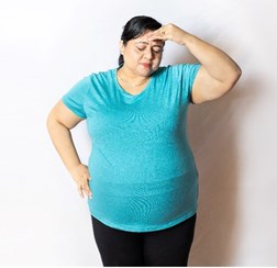 Concerned lady thinking of alternative weight loss treatments