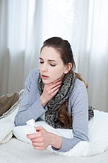A woman with a sore throat. Source: medicalimages.com