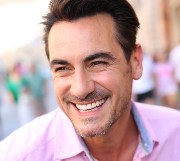 happu guy in pink shirt